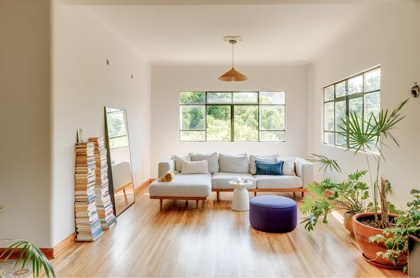 Elegant living room prepared for guests, with cleaning services organized by Kindred to maintain pristine conditions before and after visits.