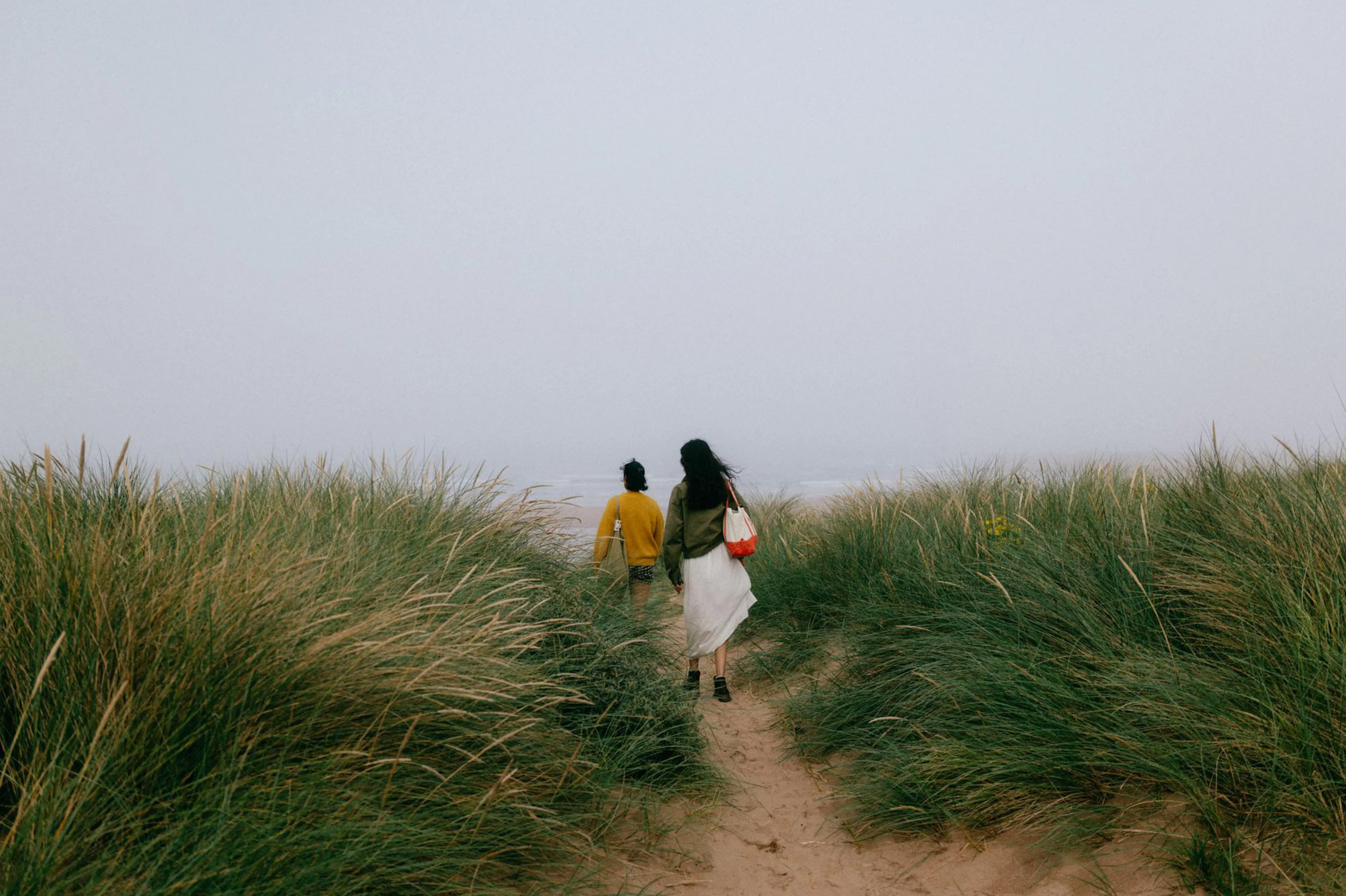 A family entering a vacation home