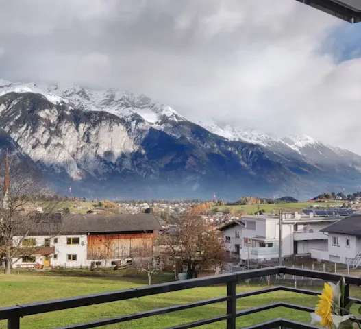 Mountain-view balcony offering tranquility, perfect for retirees seeking outdoor escapes, hiking opportunities, and stress-free travel with Kindred home swaps.