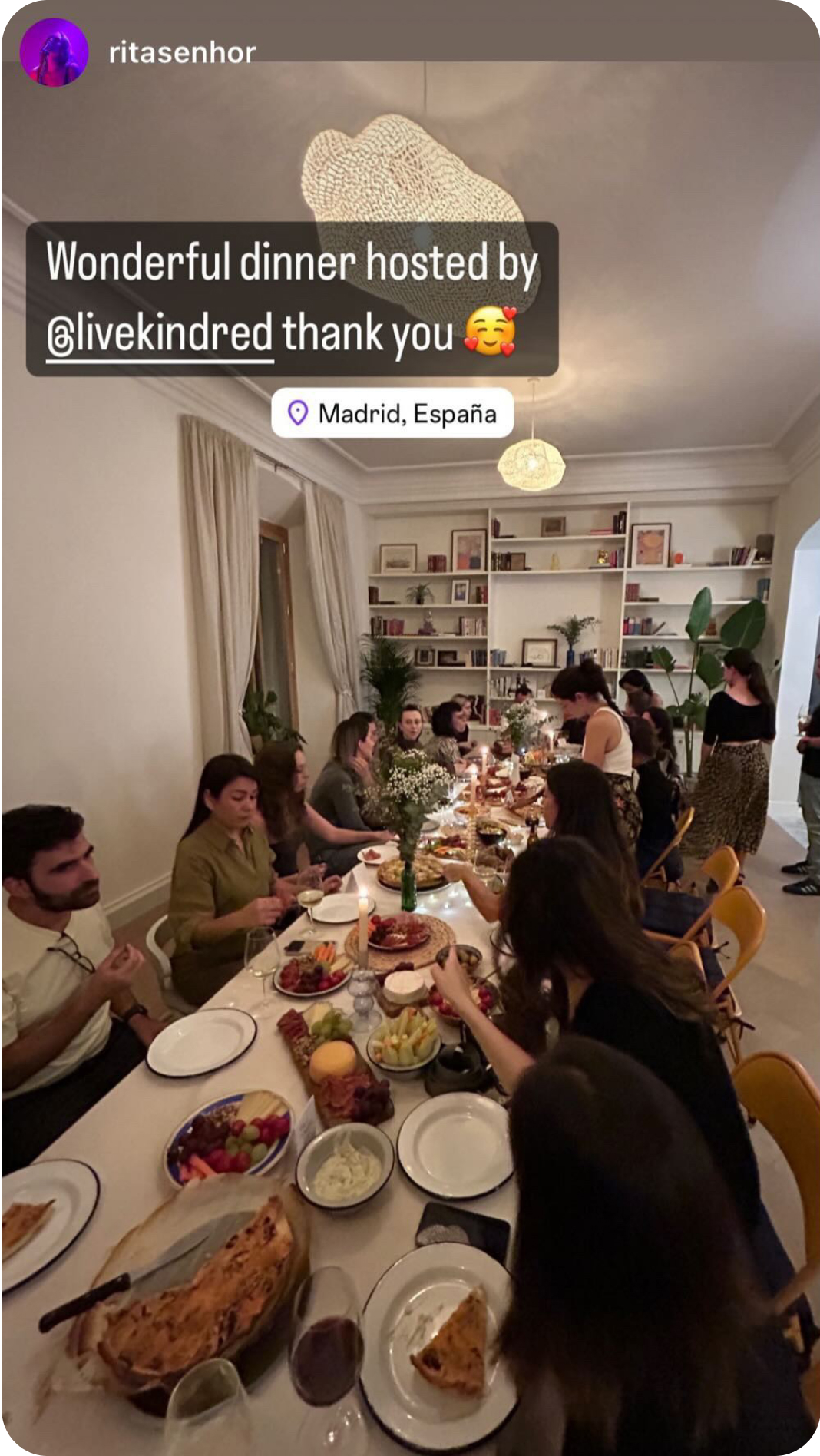 Cooking together in a rustic kitchen during a Kindred home swap. Retirees and couples enjoy the freedom to prepare meals at their leisure, embracing a slower, more intentional lifestyle.